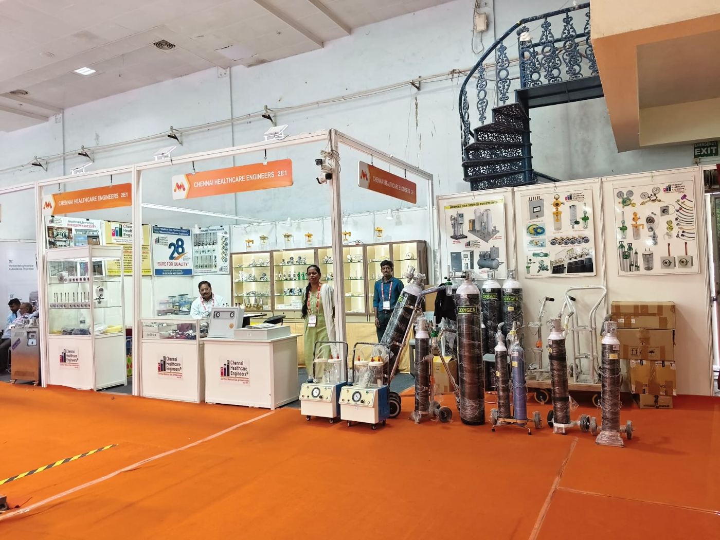 Medicall Exhibition - Wide view of Chennai Healthcare Engineers stall 2E1 with cylinders and suction machines