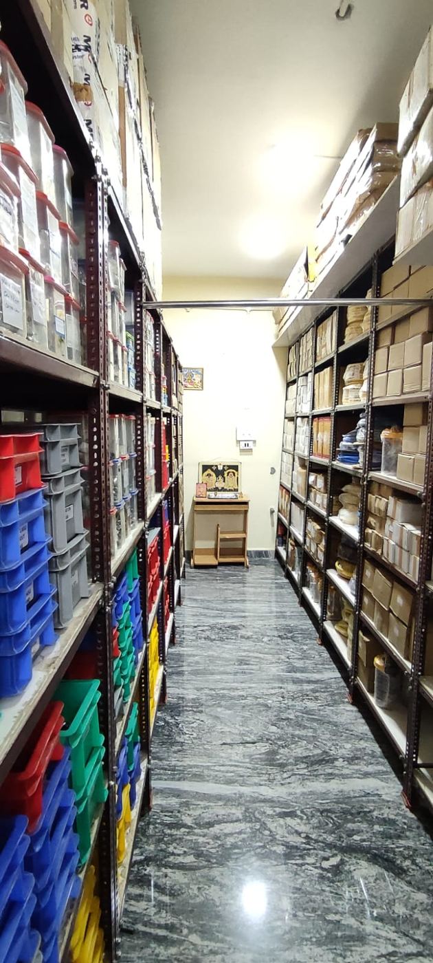 Organised spare parts stores with labelled bins and shelving